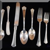 S10. Sterling silver flateware set with D monogram.